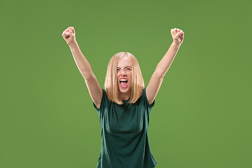 Image showing Winning success woman happy ecstatic celebrating being a winner. Dynamic energetic image of female model