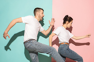 Image showing A couple of young man and woman dancing hip-hop at studio.