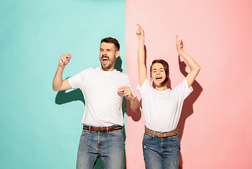 Image showing A couple of young man and woman dancing hip-hop at studio.