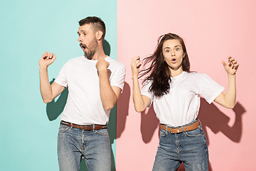 Image showing A couple of young man and woman dancing hip-hop at studio.