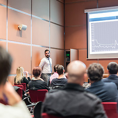 Image showing Skiled Public Speaker Giving a Talk at Business Meeting.