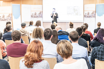 Image showing Business speaker giving a talk at business conference event.