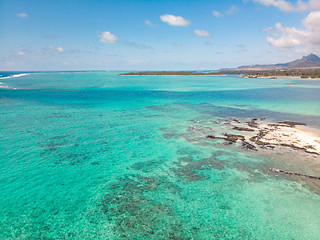 Image showing Aerial view of beautiful tropical beach with turquoise sea. Tropical vacation paradise destination of D\'eau Douce and Ile aux Cerfs Mauritius