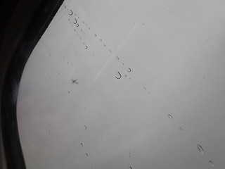 Image showing Car window with rain streaks