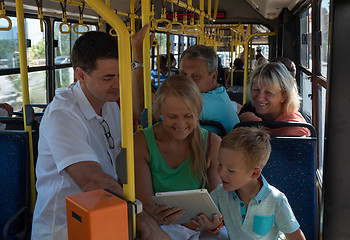 Image showing A joyful family in a bus