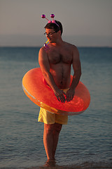 Image showing A funny equipped for swimming adult