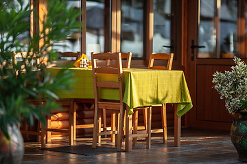 Image showing A cafe table in fresh air