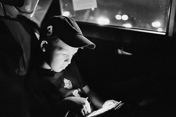 Image showing A reading boy 