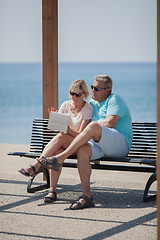 Image showing Parents have rest at the sea