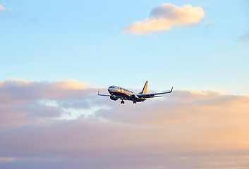 Image showing Ryanair airplane flying at sunset