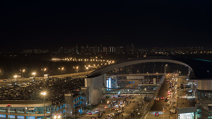 Image showing Busy car traffic in night illuminated city