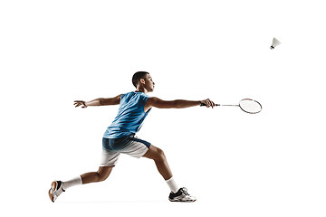 Image showing Little boy playing badminton isolated on white studio background