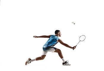 Image showing Little boy playing badminton isolated on white studio background