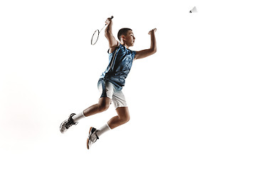 Image showing Little boy playing badminton isolated on white studio background