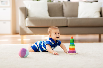 Image showing sweet little asian baby boy with toys at home