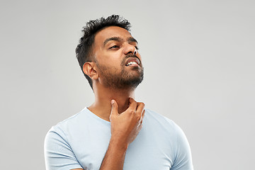 Image showing indian man suffering from neck pain or sore throat