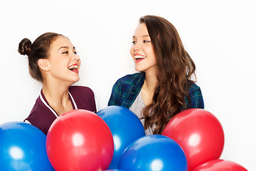 Image showing happy teenage girls with helium balloons