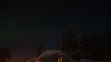 Image showing Man shooting northern lights