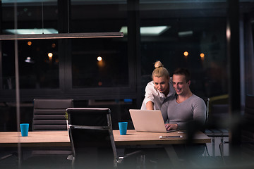 Image showing young designers in the night office