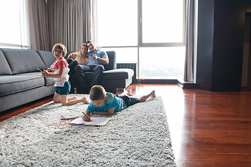 Image showing young couple spending time with kids