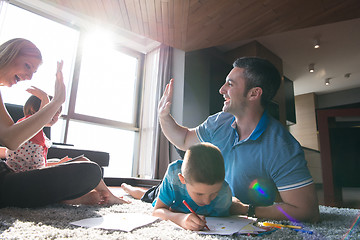 Image showing young couple spending time with kids