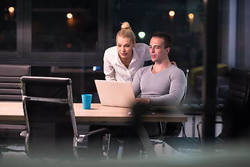 Image showing young designers in the night office