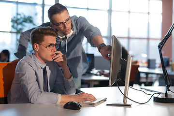 Image showing Two Business People Working With computer in office