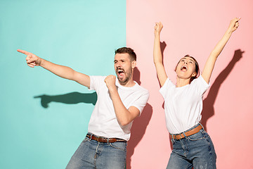 Image showing A couple of young man and woman dancing hip-hop at studio.