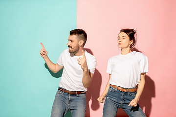 Image showing A couple of young man and woman dancing hip-hop at studio.