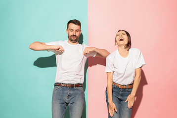 Image showing A couple of young man and woman dancing hip-hop at studio.