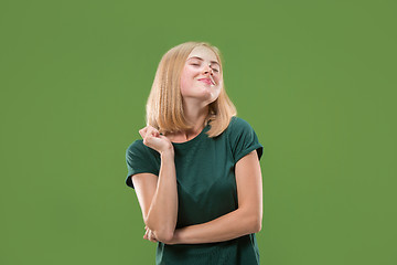 Image showing happy woman. image of female model on green