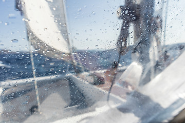 Image showing Sailing yacht catamaran sailing in rough sea. Sailboat. Sailing concept.