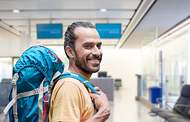 Image showing man with backpack over airport terminal