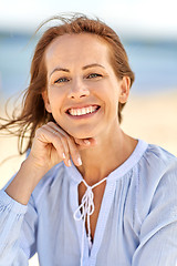 Image showing portrait of happy smiling woman on summer beach