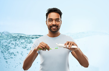 Image showing indian man with toothbrush and toothpaste