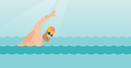 Image showing Young caucasian sportsman swimming.