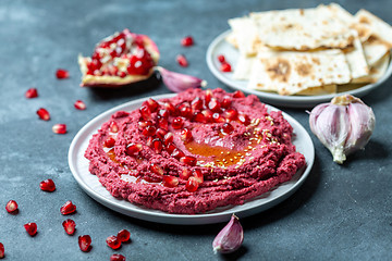 Image showing Traditional spread beetroot hummus.