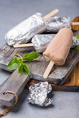 Image showing Artisanal ice cream covered with chocolate.