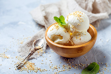 Image showing Ice cream balls with sesame seed.
