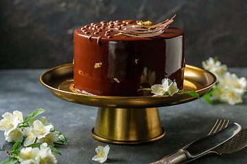 Image showing Modern mousse cake with chocolate decor.