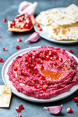 Image showing Traditional homemade beetroot hummus.