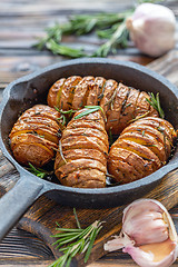 Image showing Potatoes baked with garlic and rosemary.