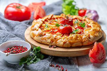 Image showing Homemade open pie (Galette) with potatoes.