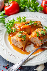 Image showing Cabbage rolls stuffed with ground beef and rice.