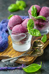 Image showing Blueberry ice cream with basil in glasses.