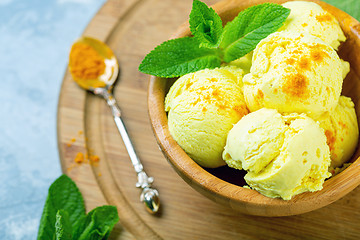 Image showing Golden ice cream with turmeric closeup.