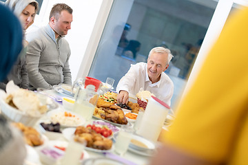 Image showing modern multiethnic muslim family having a Ramadan feast