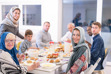 Image showing modern multiethnic muslim family having a Ramadan feast