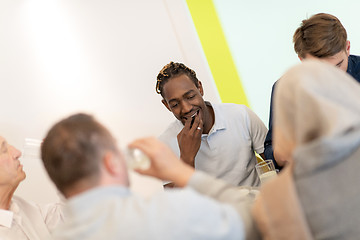 Image showing black man enjoying iftar dinner with family