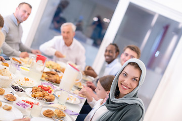 Image showing modern multiethnic muslim family having a Ramadan feast